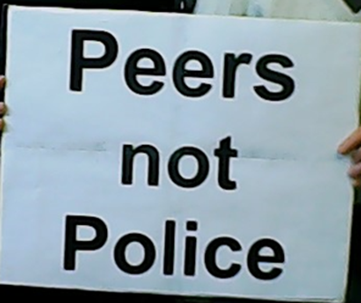 Sign reading Peers not Police